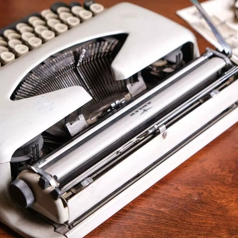 Adler brand typewriter with vintage bag
