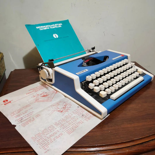 1970's Germany  Olympia brand Traveller De Luxe model portable popart typewriter  rare color