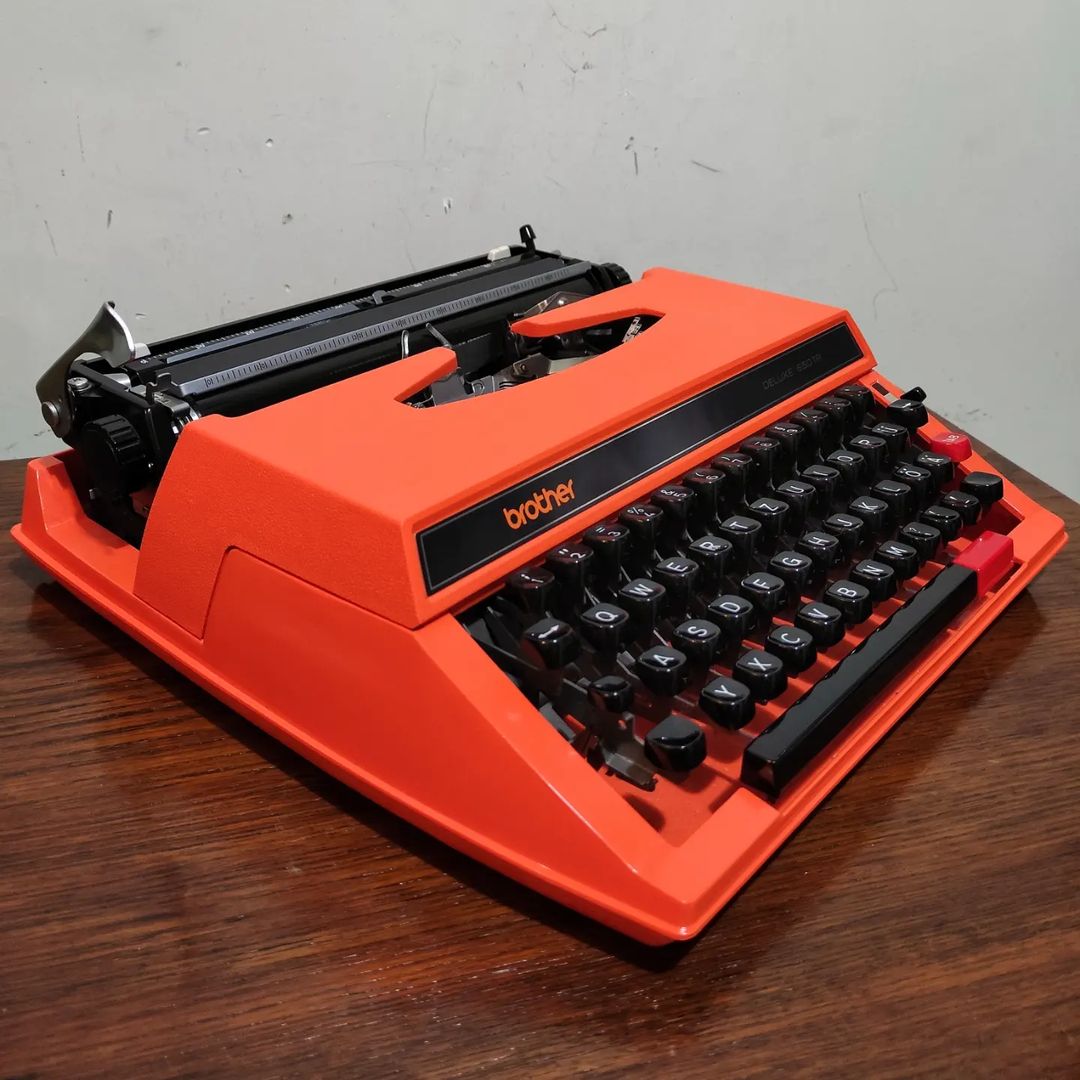 1970's Japan Brother brand Deluxe 650TR model portable pop art Orange typewriter