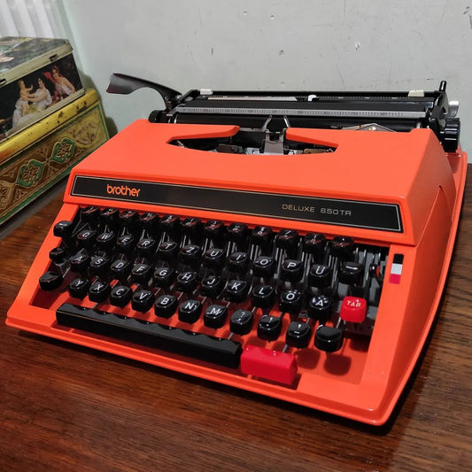 1970's Japan Brother brand Deluxe 650TR model portable pop art Orange typewriter