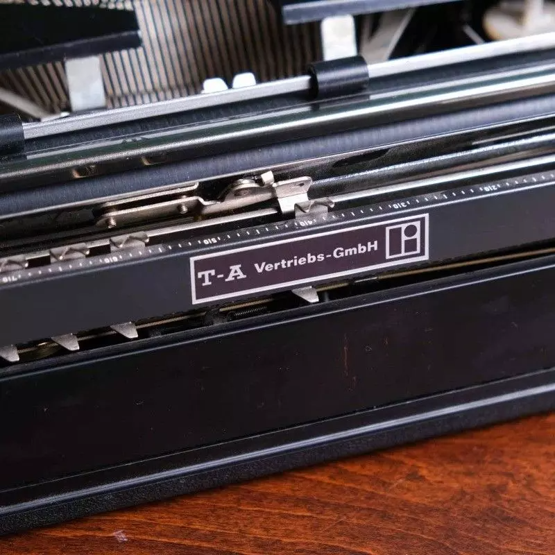 Contessa vintage black typewriter.