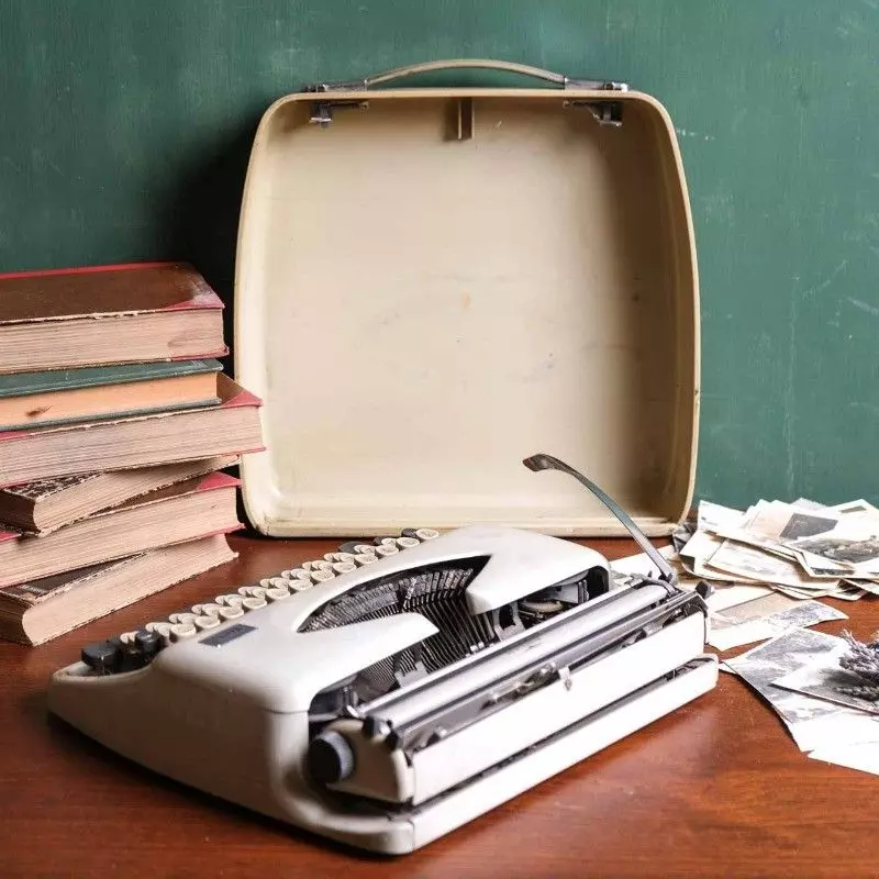 Adler brand typewriter with vintage bag