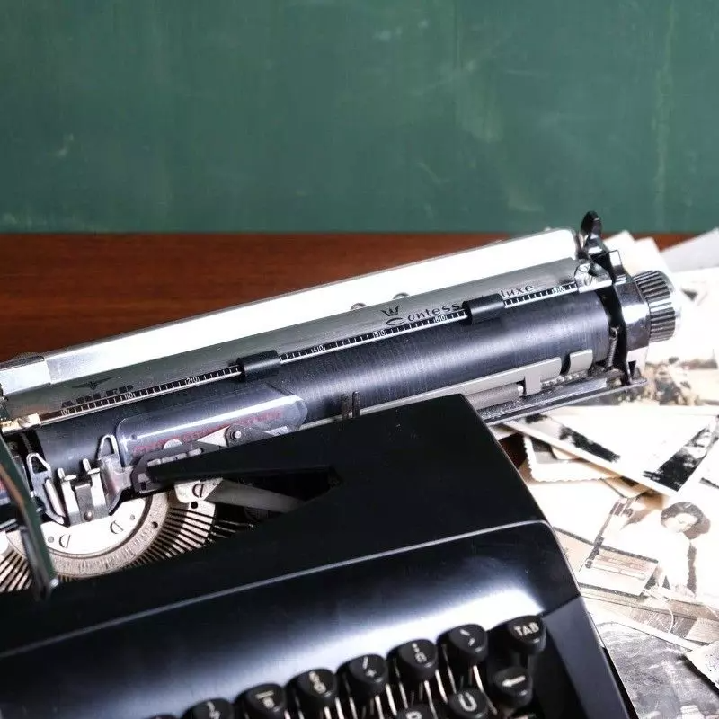 Contessa vintage black typewriter.