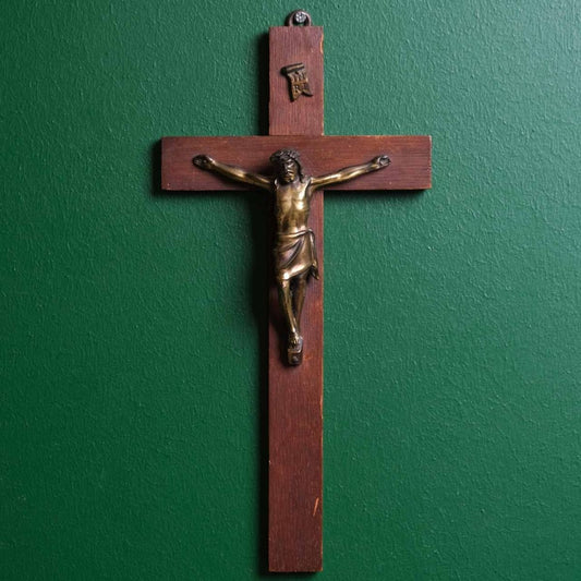 Pilgrimage and Jesus ,Brass Jesus icon on wooden cross