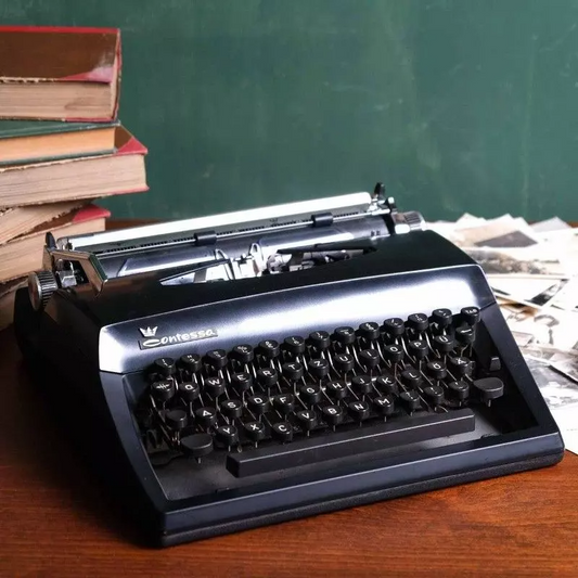 Contessa vintage black typewriter.