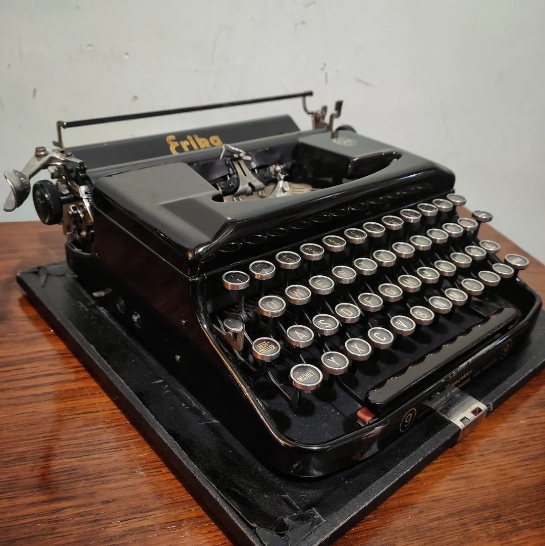 1950's Germany  Erika brand 9 model portable typewriter  Leather cover carrying case