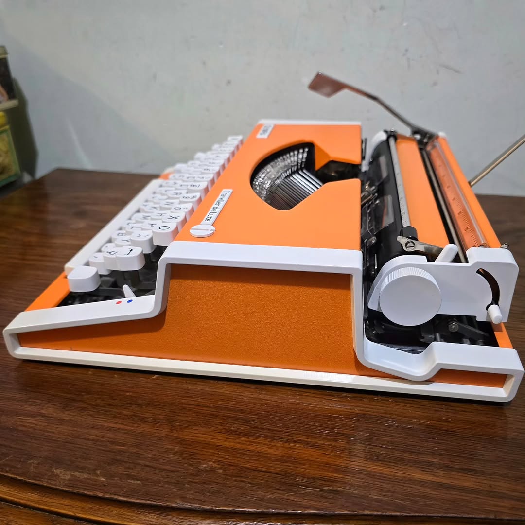 1970's Germany  Olympia brand Traveler De Luxe model portable popart typewriter