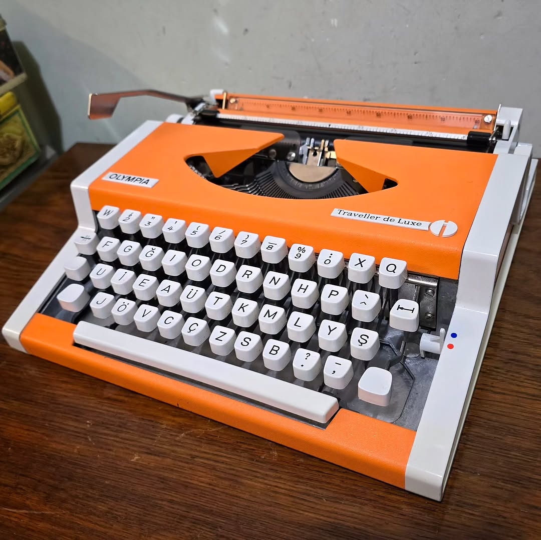 1970's Germany  Olympia brand Traveler De Luxe model portable popart typewriter