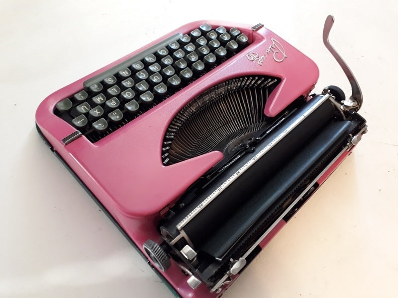 Princess portable typewriter, made in Germany, manufactured in the 1950s. Q keyboard,Pink Color Typewriter