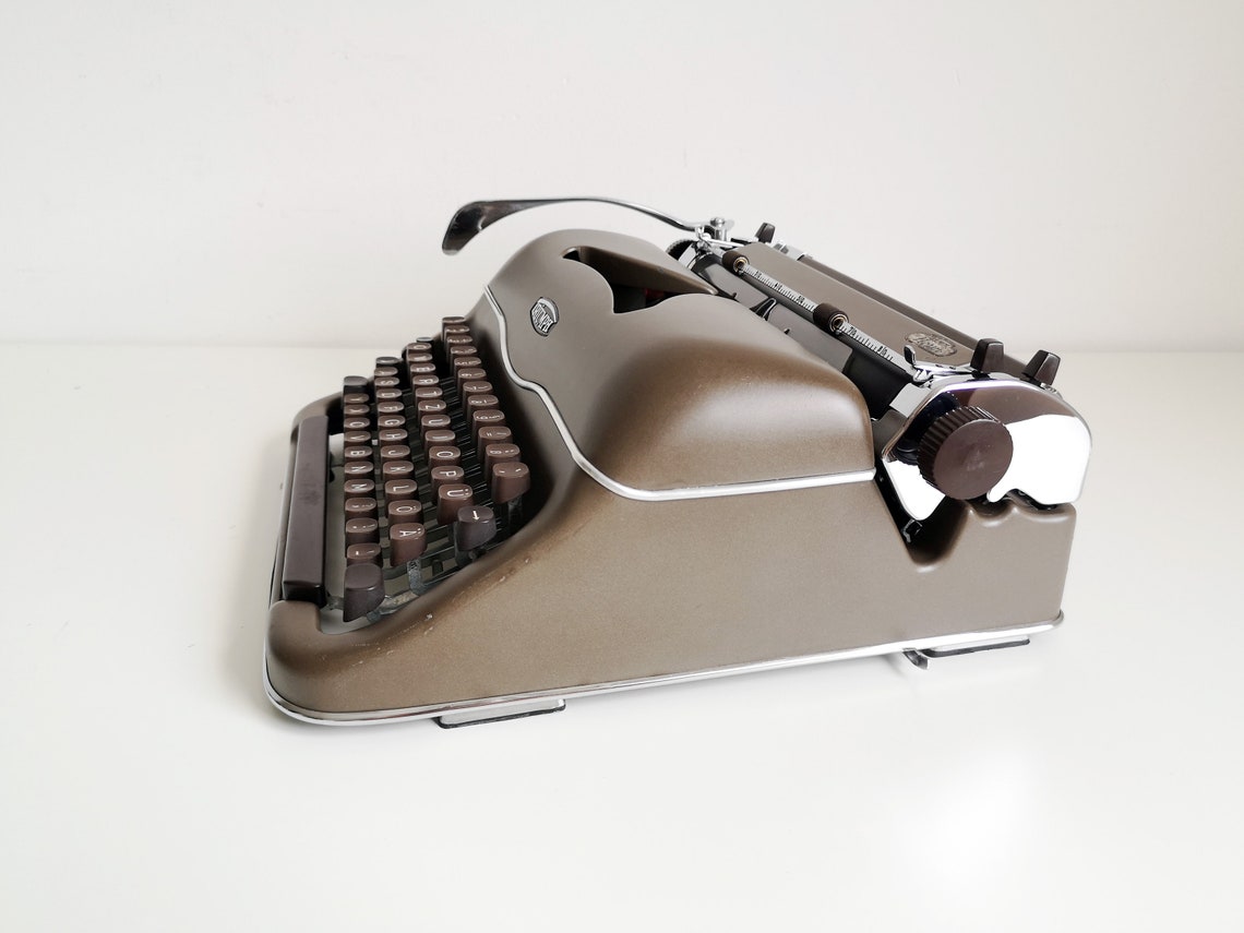 Triumph Norm vintage Typewriter from the 1950s, rare original chocolate color, Unusual gift, retro office type writer.