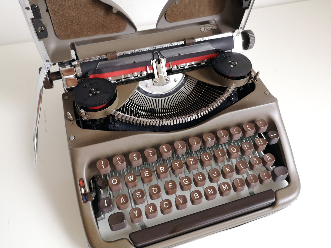 Triumph Norm vintage Typewriter from the 1950s, rare original chocolate color, Unusual gift, retro office type writer.