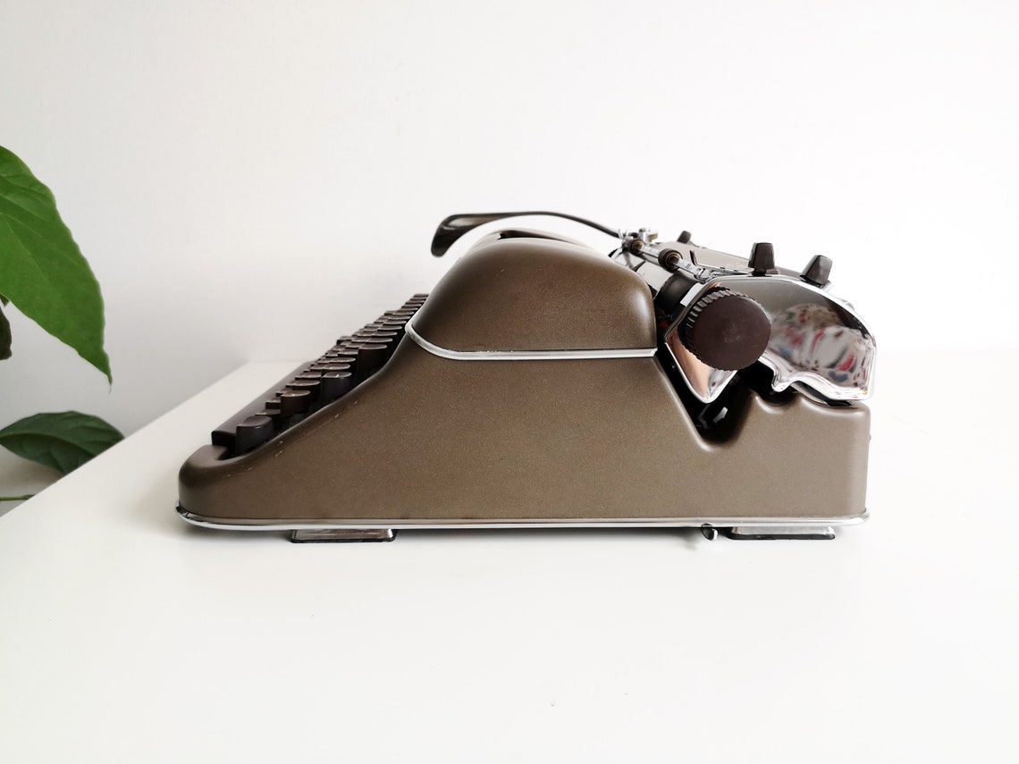 Triumph Norm vintage Typewriter from the 1950s, rare original chocolate color, Unusual gift, retro office type writer.