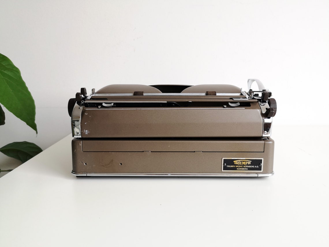 Triumph Norm vintage Typewriter from the 1950s, rare original chocolate color, Unusual gift, retro office type writer.