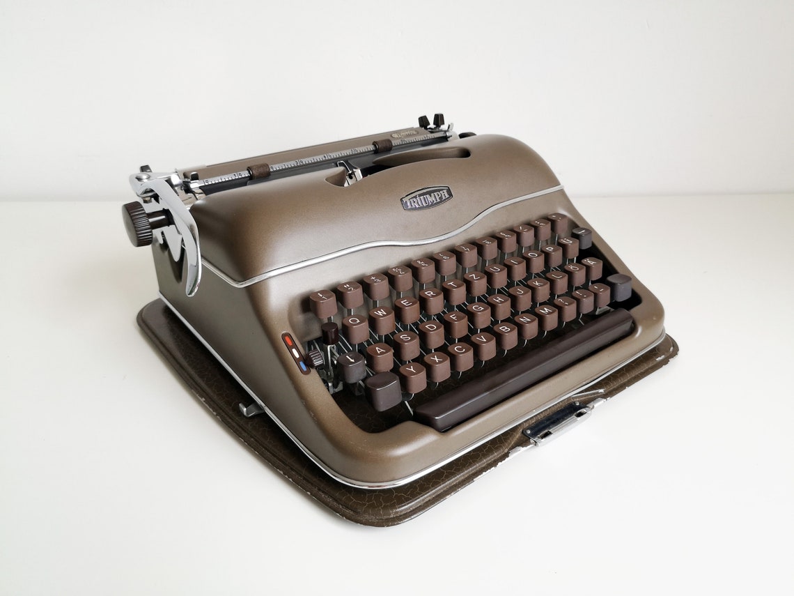 Triumph Norm vintage Typewriter from the 1950s, rare original chocolate color, Unusual gift, retro office type writer.