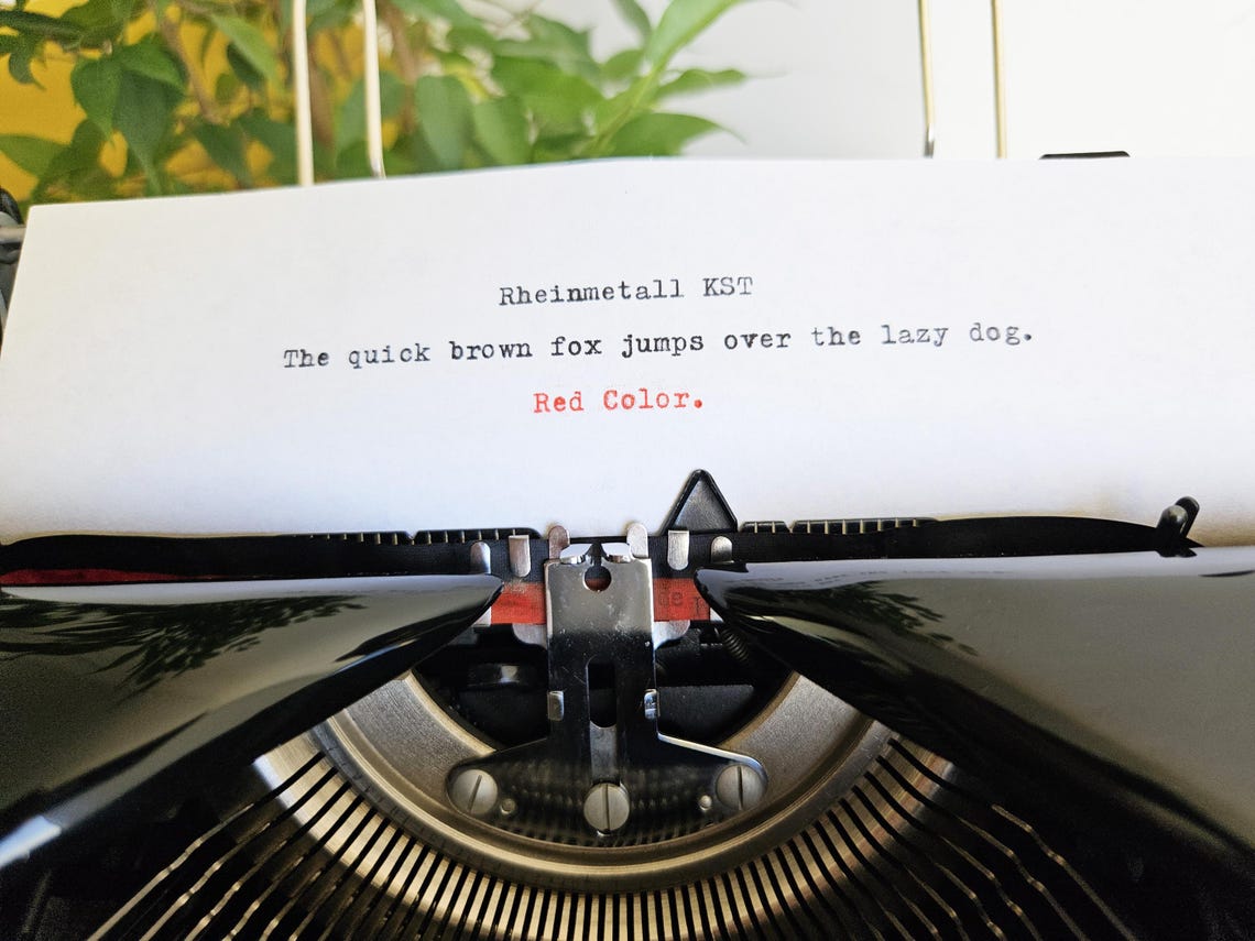 Rheinmetall KST Typewriter, original black color, from the 1950s. With original case. Collectible. Unusual gift.