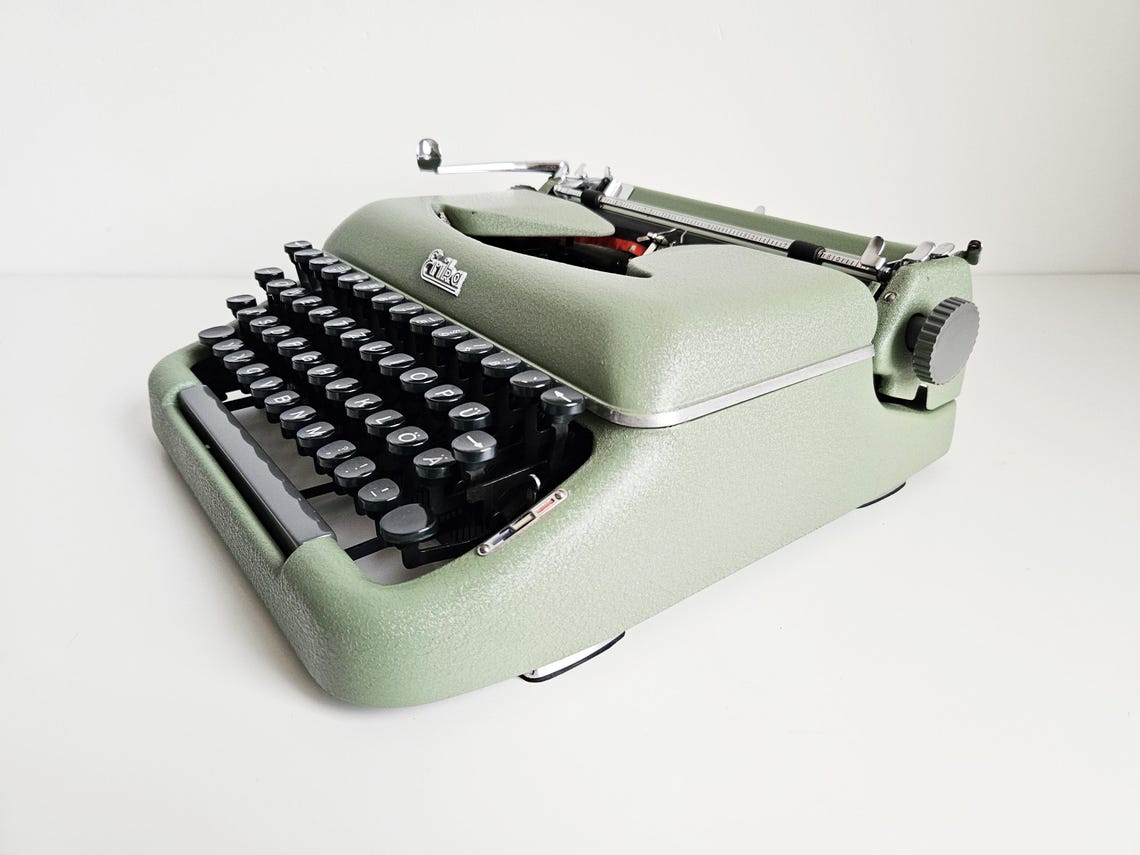 Erika Model 10 a portable working vintage typewriter from the 1950s