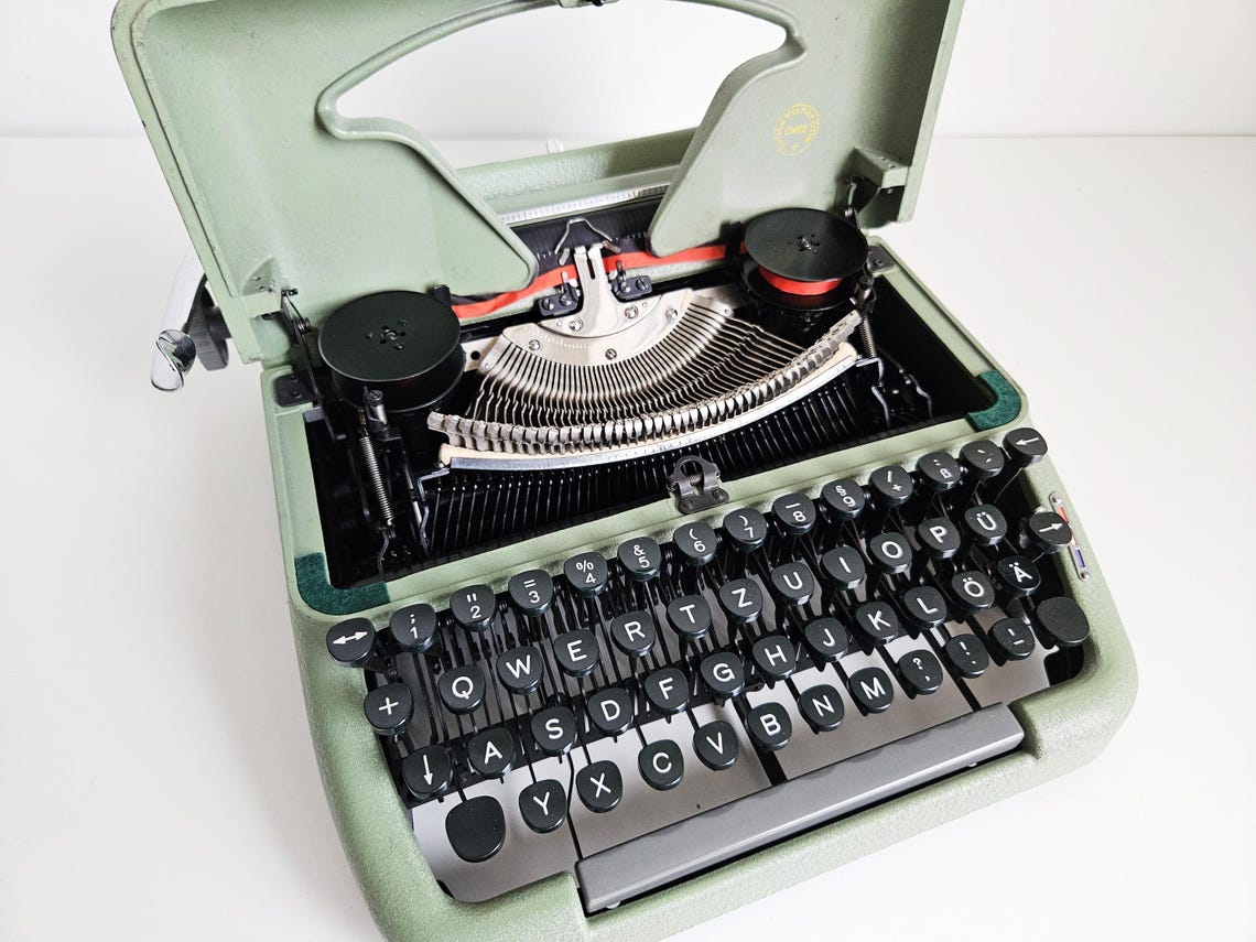 Erika Model 10 a portable working vintage typewriter from the 1950s