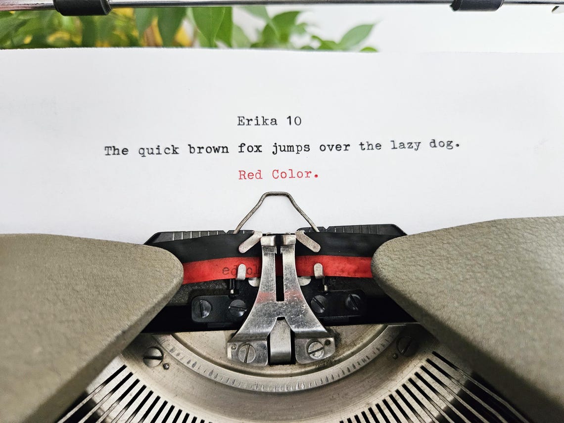 Erika Model 10 a portable working vintage typewriter from the 1950s. In awesome condition, with case, unusual gift, retro office