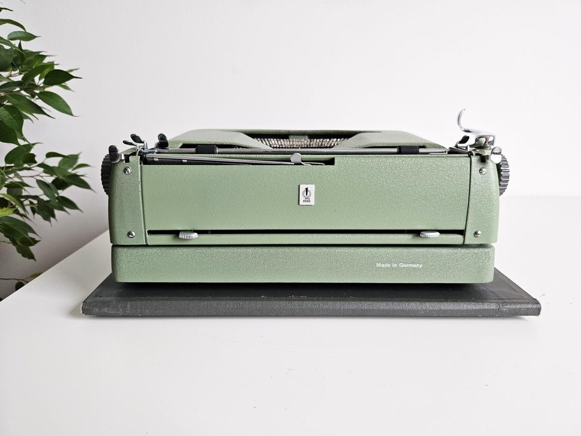 Erika Model 10 a portable working vintage typewriter from the 1950s