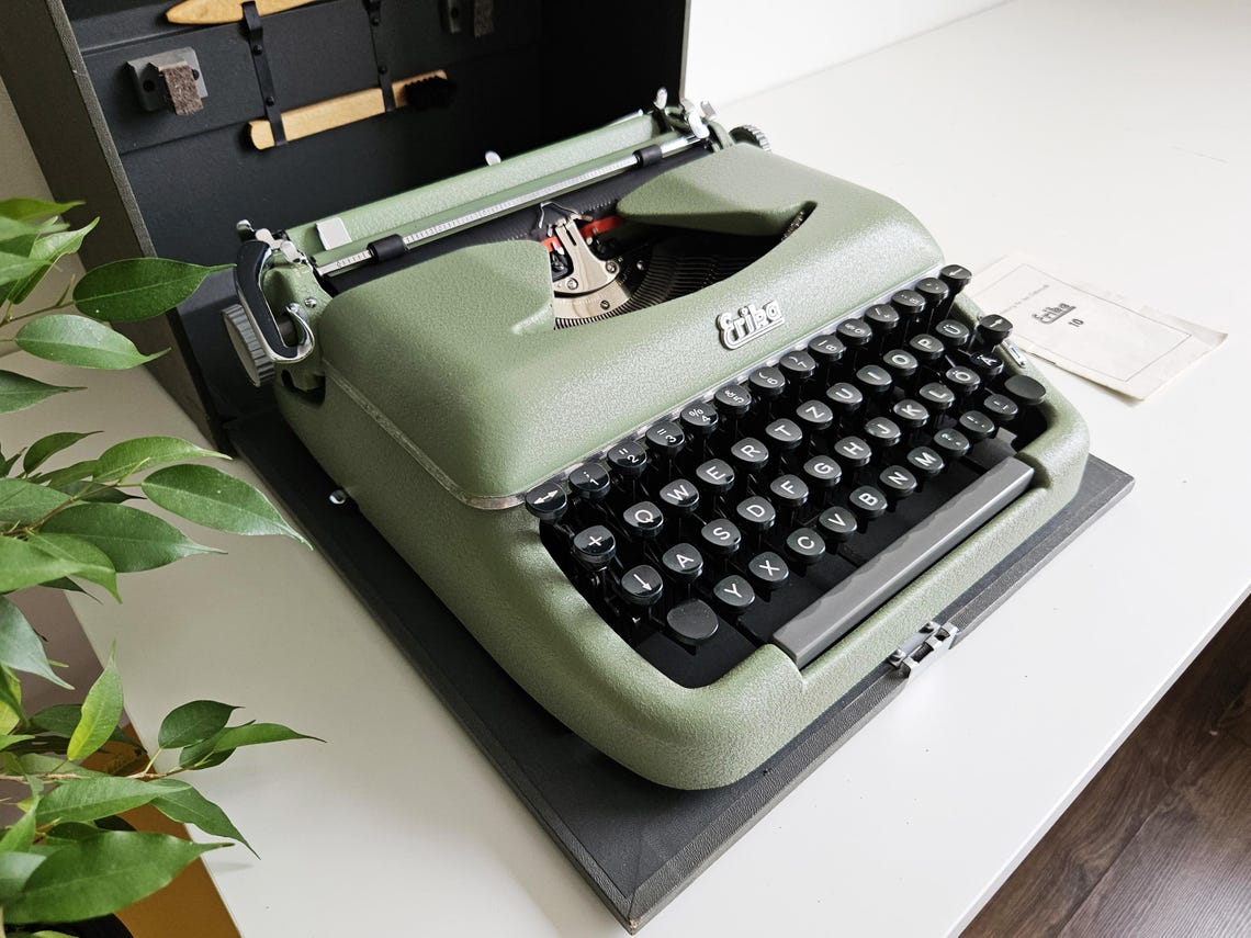 Erika Model 10 a portable working vintage typewriter from the 1950s