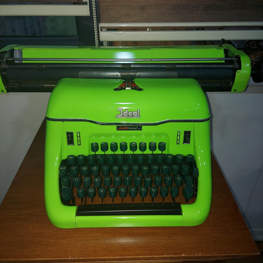 A magnificent 1955 model IDEAL antique pistachio green typewriter