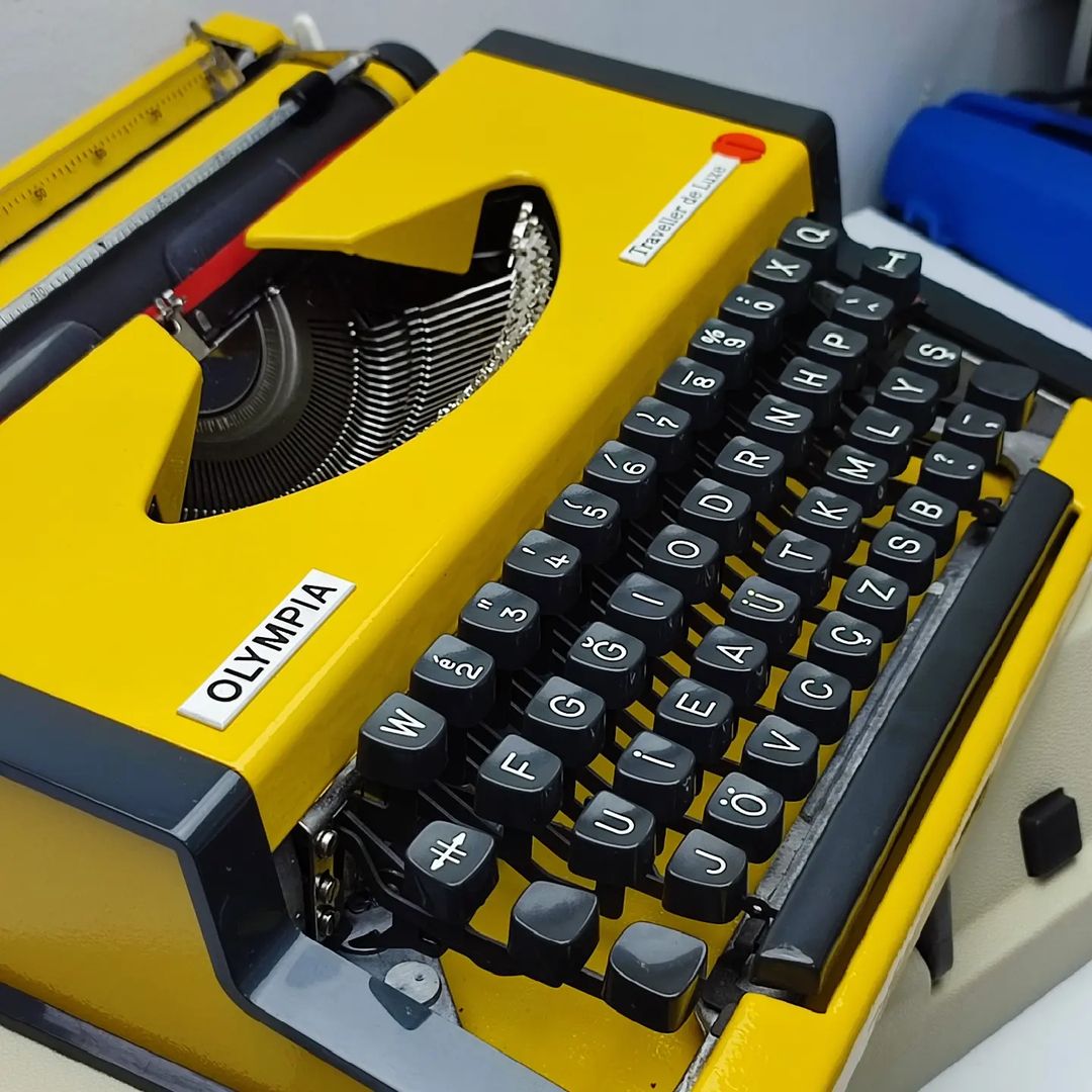 MUSTARD YELLOW COLOR OLYMPIA ANTIQUE TYPEWRITER