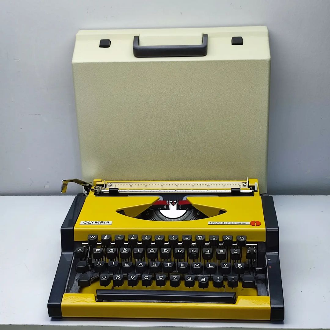 MUSTARD YELLOW COLOR OLYMPIA ANTIQUE TYPEWRITER