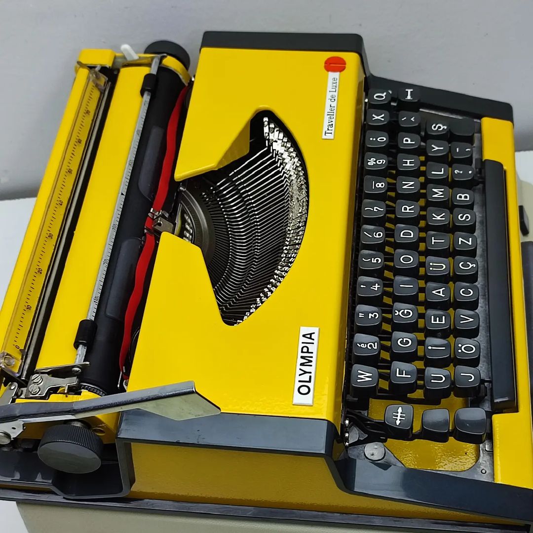 MUSTARD YELLOW COLOR OLYMPIA ANTIQUE TYPEWRITER