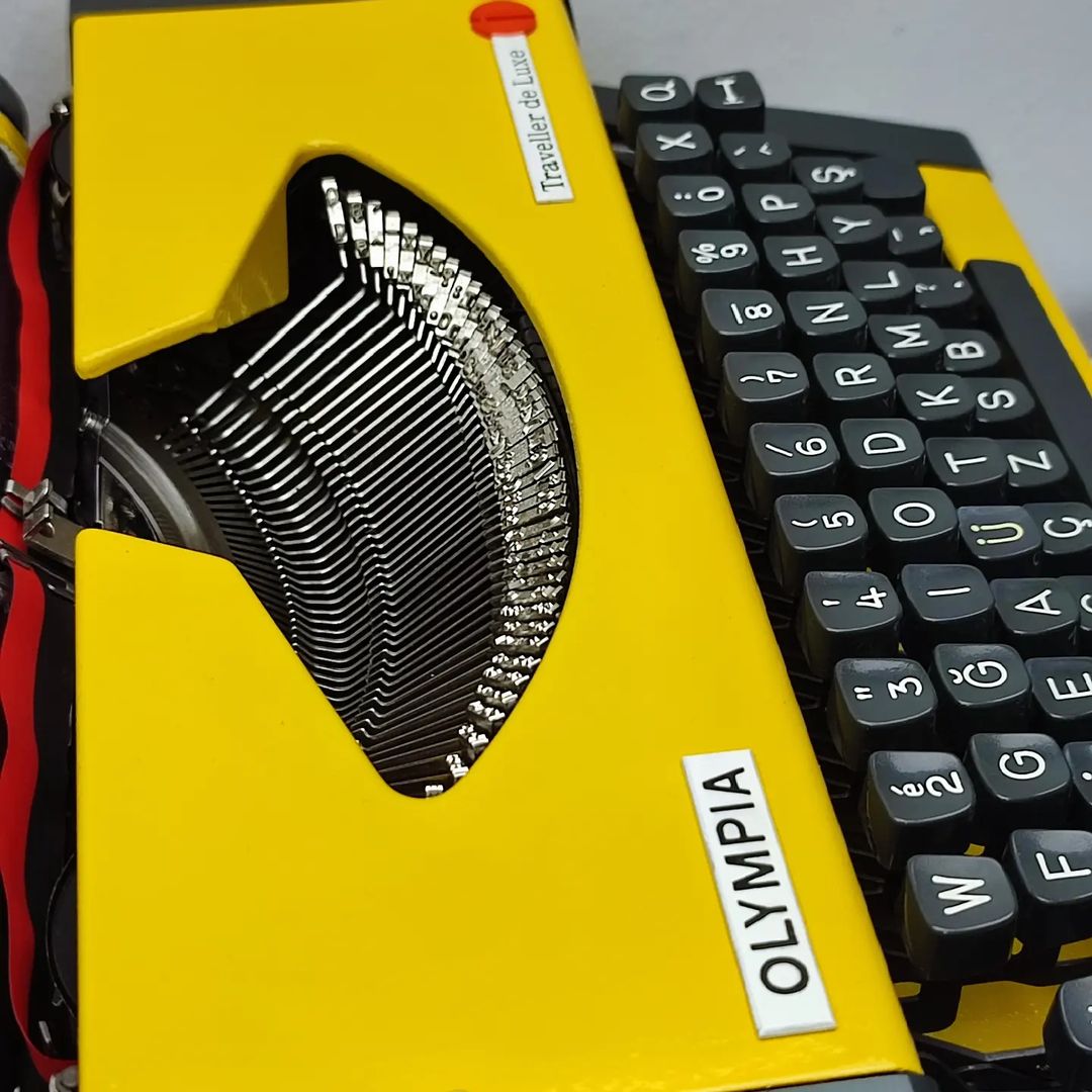 MUSTARD YELLOW COLOR OLYMPIA ANTIQUE TYPEWRITER