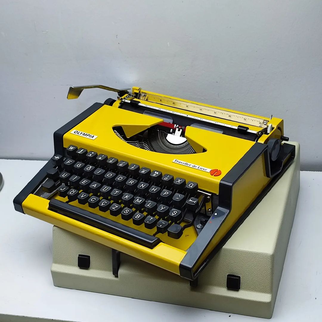 MUSTARD YELLOW COLOR OLYMPIA ANTIQUE TYPEWRITER
