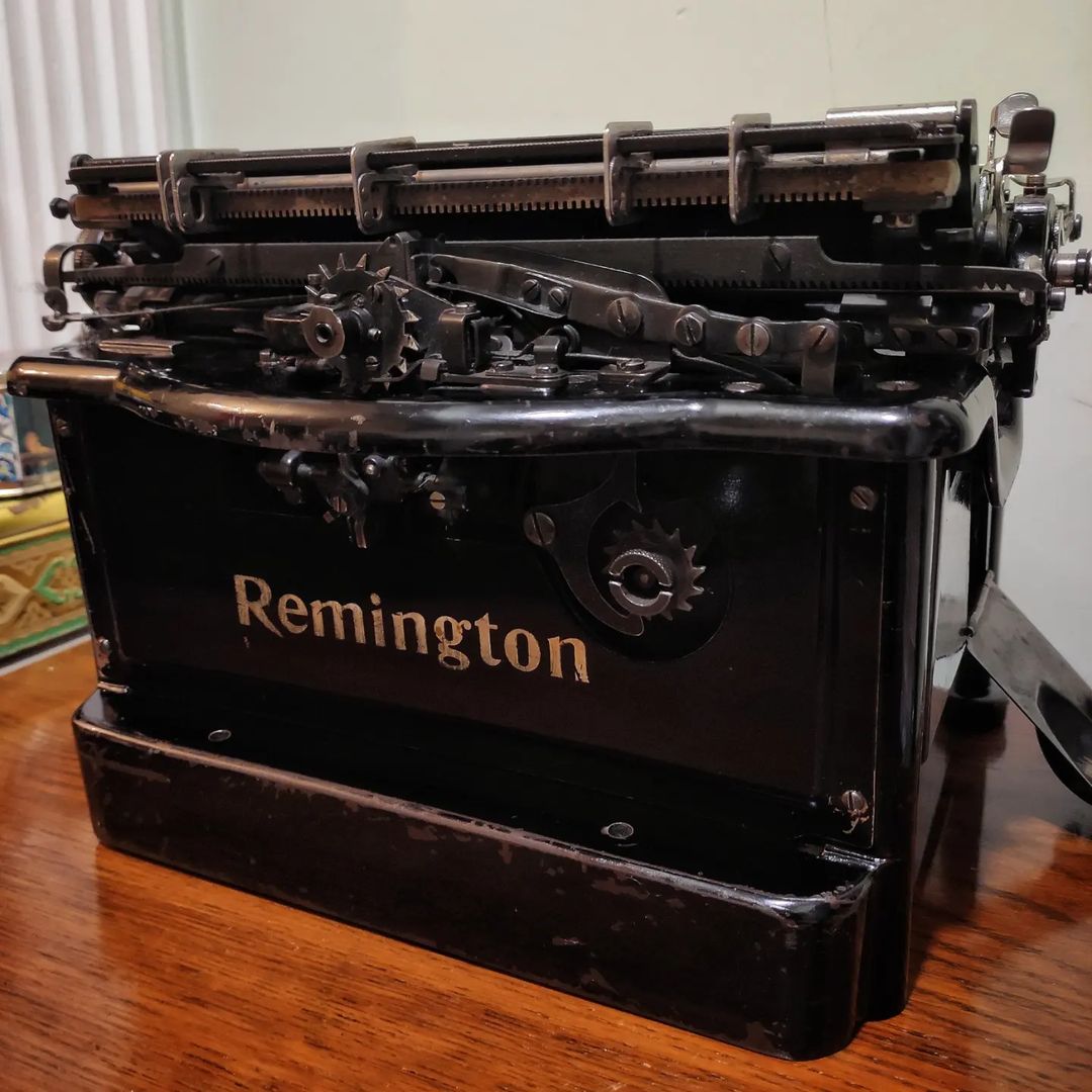 Remington brand 92 office typewriter  Chrome plated white glass key