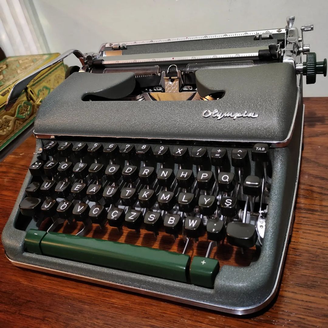 1960's Germany  Olympia brand SM4 model portable typewriter with serial number 1722848