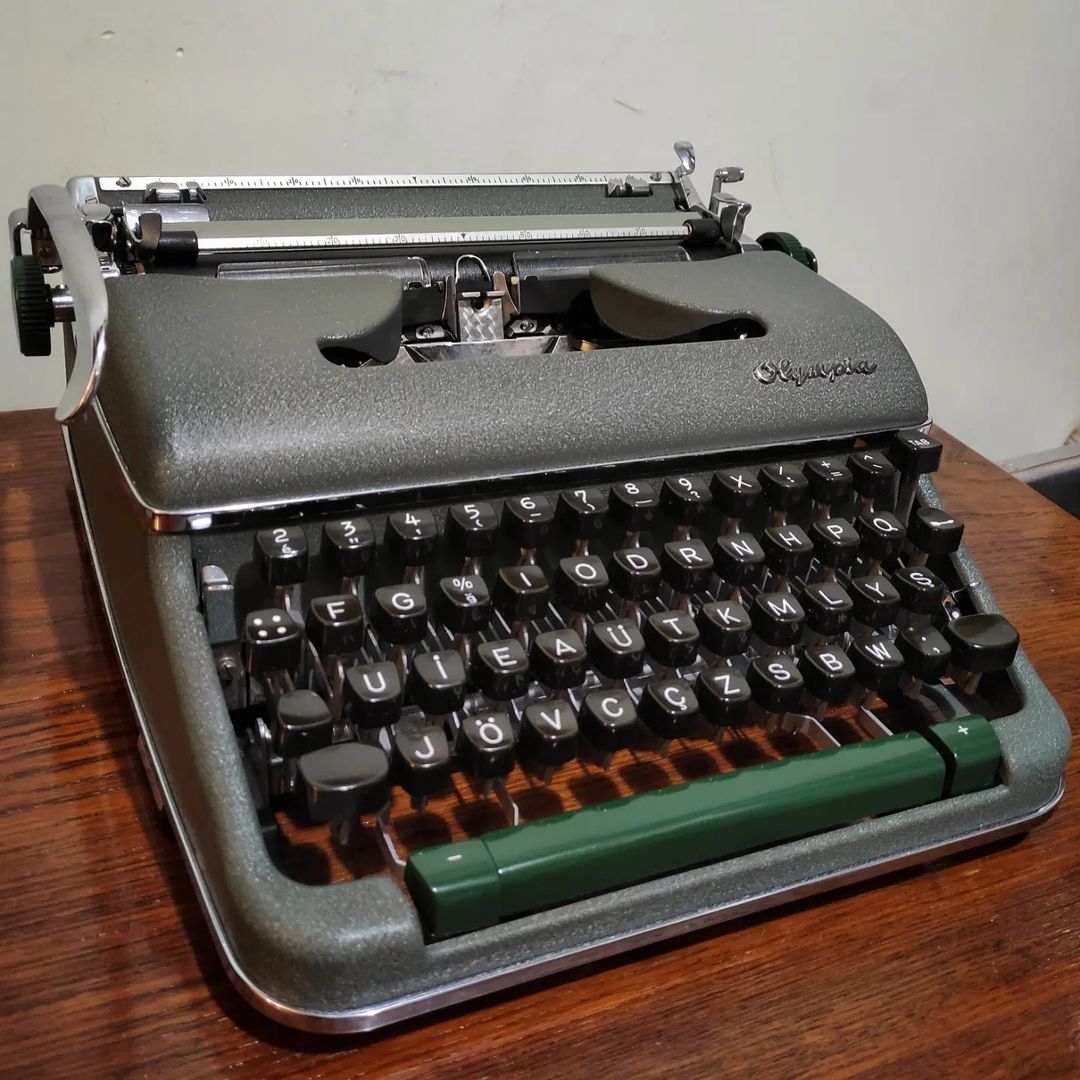 1960's Germany  Olympia brand SM4 model portable typewriter with serial number 1722848